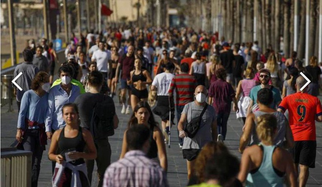 Nới lỏng giãn cách xã hội, dân Tây Ban Nha vẫn phải đeo khẩu trang - Ảnh 1.