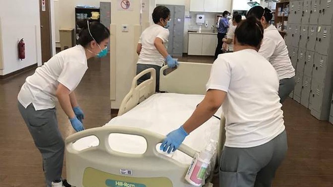 Đứng trước cơn sóng thần bệnh nhân Covid-19, Singapore đã ứng phó ra sao để duy trì tỷ lệ tử vong thấp? - Ảnh 4.