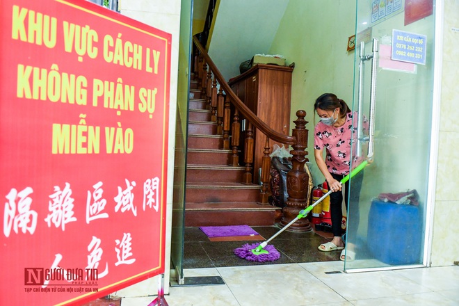Phun khử khuẩn khu cách ly thương nhân Trung Quốc sang Lục Ngạn thu mua vải thiều - Ảnh 2.