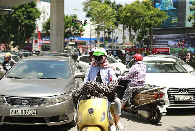 Nắng nóng kéo dài đến bao giờ? - Ảnh 1.