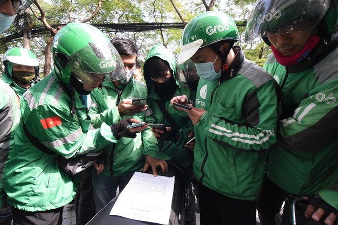 Tổng cục Thuế y&ecirc;u cầu Grab thận trọng khi ph&aacute;t ng&ocirc;n về việc tăng gi&aacute; cước - Ảnh 1.