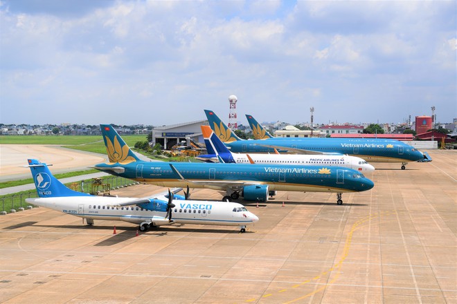Vietnam Airlines Group khuyến cáo hành khách dịp cao điểm Tết: Cảnh giác với những website bán vé không chính thức, được thiết kế gần giống website chính thức của hãng - Ảnh 1.