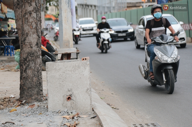 Nâng đường chống ngập ở Sài Gòn, nhà dân biến thành “hầm”: Mỗi lần chui ra chui vào lại đụng đầu, bỏ 100 triệu nâng nền - Ảnh 3.