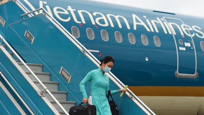 Khởi tố nam tiếp viên hãng hàng không Vietnam Airlines làm lây lan dịch Covid-19 - Ảnh 1. Khởi tố nam tiếp viên hãng hàng không Vietnam Airlines làm lây lan dịch Covid-19 - Ảnh 1.