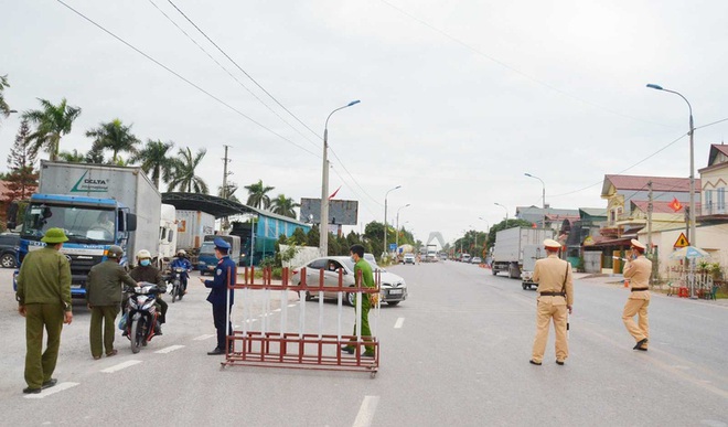 Dịch Covid-19 ngày 29/1: Giãn cách xã hội 21 ngày toàn bộ thị xã Đông Triều (Quảng Ninh) - Ảnh 1.