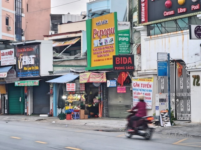 Hình ảnh Sài Gòn ngày đầu nới lỏng giãn cách qua ống kính smartphone - Ảnh 1.