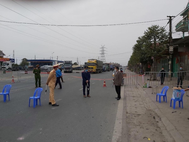 Dịch Covid-19 ngày 12/2: Hà Nội thêm 1 ca nghi nhiễm; Tết đầy xúc động trong những khu cách ly - Ảnh 1.