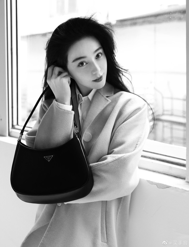 Hậu "lời nguyền đại sứ", Prada vẫn hot ầm ầm nhờ chiếc túi lấy lòng mỹ nhân khắp nơi, sao nữ Việt dùng cũng siêu nhiều - Ảnh 4.