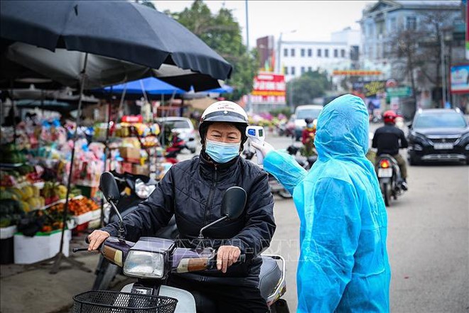 Diễn biến dịch ngày 6/2: Hải Phòng điều chỉnh quy định kiểm soát người ra vào sau nửa ngày thực hiện - Ảnh 1.