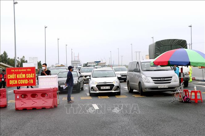 Quảng Ninh dỡ bỏ hoàn toàn các chốt kiểm dịch COVID-19 ra, vào tỉnh - Ảnh 1.