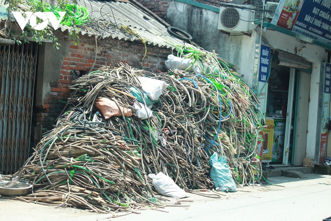 Ngạt thở vì ô nhiễm ở làng tái chế nhựa phế thải lớn nhất Hà Nội - Ảnh 14.