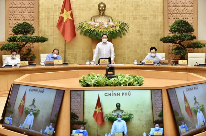 Thủ tướng Phạm Minh Chính: Chuyển phòng chống dịch Covid-19 từ phòng ngự sang tấn công - Ảnh 1.