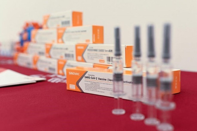 Trung Quốc là nước đầu tiên phê duyệt tiêm vaccine COVID-19 cho trẻ từ 3 tuổi - Ảnh 1.