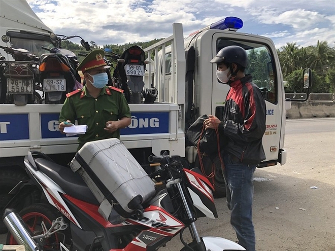 Diễn biến dịch ngày 23/7: Thêm 3.987 ca mắc COVID-19; Hà Nội thực hiện giãn cách xã hội theo Chỉ thị 16 như thế nào? - Ảnh 1.