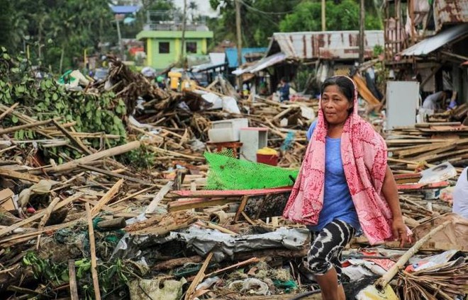 Gió mùa, bão nhiệt đới nhấn chìm thủ đô của Philippines - Ảnh 3.