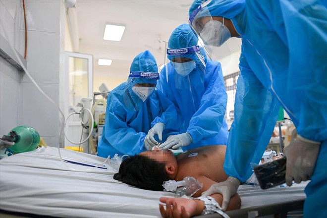 Phó Thủ tướng Vũ Đức Đam: Tiêm hết vắc-xin cho người dân TP.HCM - Ảnh 1.