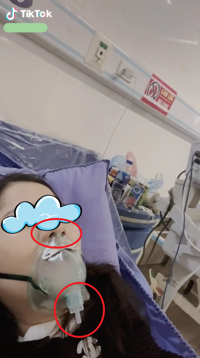 Cô gái gây tranh cãi khi quay video ốm nặng, thở không ra hơi nhưng mũi lại nằm ngoài mặt nạ trợ thở đang không gắn dây - Ảnh 2. Cô gái gây tranh cãi khi quay video ốm nặng, thở không ra hơi nhưng mũi lại nằm ngoài mặt nạ trợ thở đang không gắn dây - Ảnh 2.