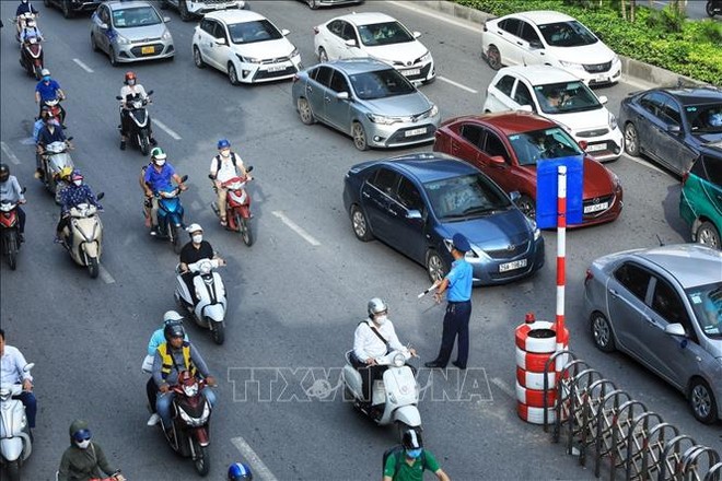 Hà Nội: Tiếp tục điều chỉnh giao thông nút Ngã Tư Sở - Ảnh 1.