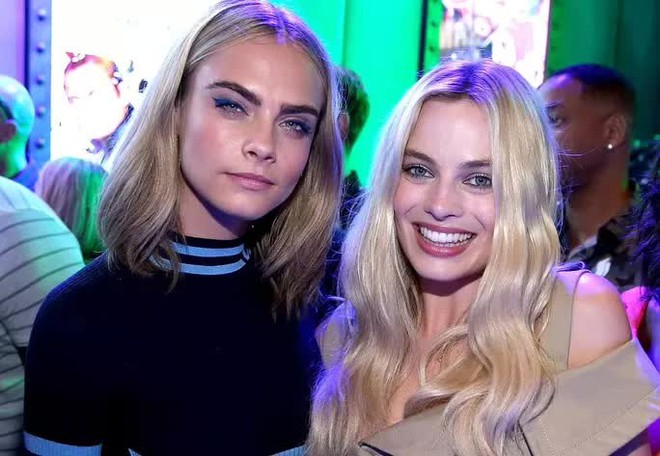Chụp l&eacute;n hai mỹ nh&acirc;n Margot Robbie v&agrave; Cara Delevingne, tay săn ảnh bị đ&aacute;nh g&atilde;y tay - Ảnh 2.