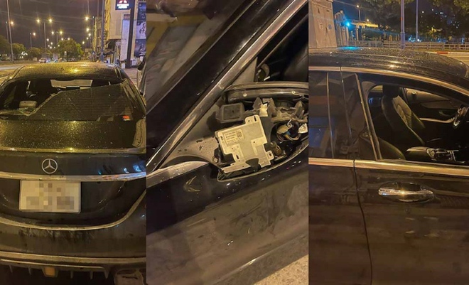 Nhân viên quán ăn ở TP.HCM đập phá ô tô của khách - Ảnh 1.