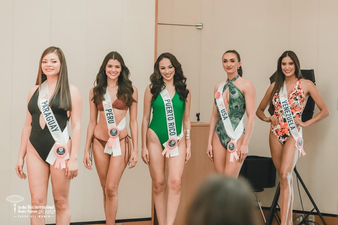 Th&iacute; sinh Hoa hậu Quốc tế lộ nhiều nhược điểm cơ thể khi thi bikini - Ảnh 12.