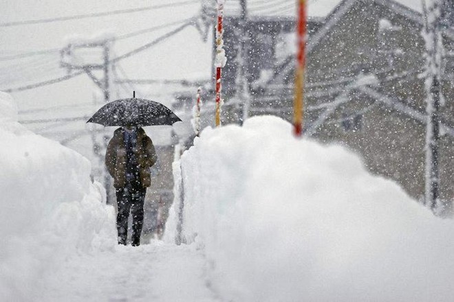 Bão tuyết tại Mỹ, Nhật Bản gây thương vong - Ảnh 8.