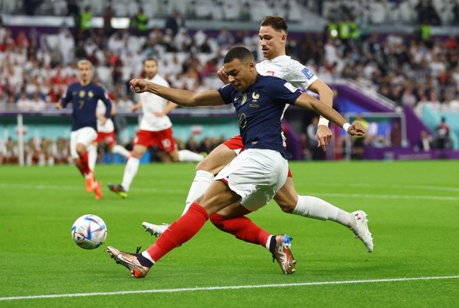 Giroud và Mbappe thay nhau ghi bàn, Pháp dễ dàng vào tứ kết World Cup 2022 - Ảnh 1.