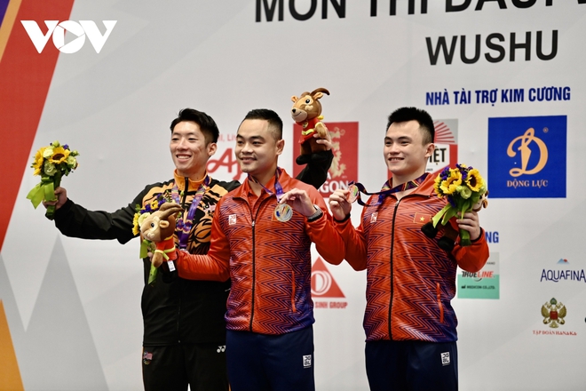 Wushu Việt Nam bội thu HCV ngày mở màn SEA Games 31 - Ảnh 12.