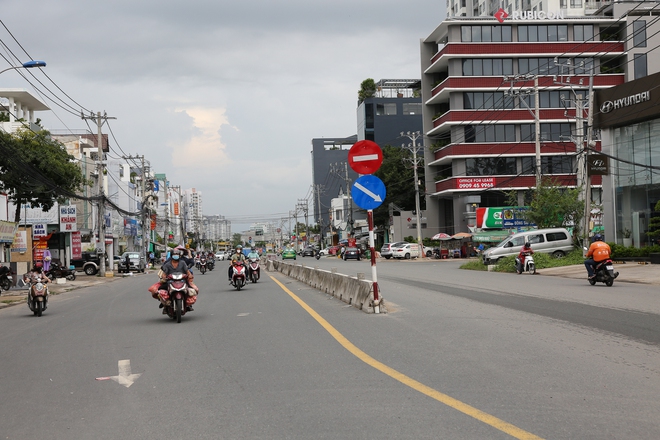 Cận cảnh 2,5km đường giá 800 tỉ ở TP.HCM được tái thi công sau 7 năm: Người dân phấn khởi - Ảnh 13.