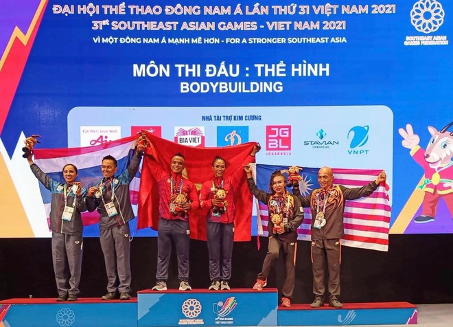 Nữ lực sĩ được bố mẹ chồng ra tận Hà Nội cổ vũ dự SEA Games: "Mình từng hỏi chồng rằng vợ cơ bắp vậy anh có sợ không?" - Ảnh 7.