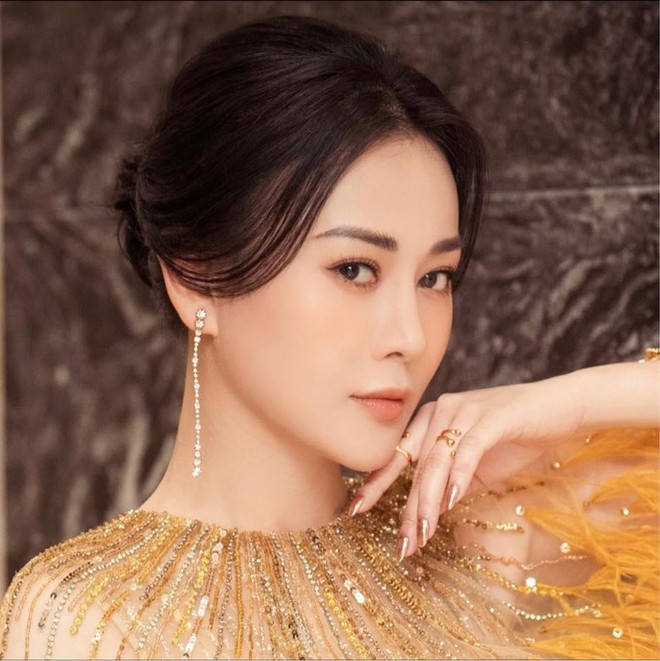 Diện lại v&aacute;y l&ocirc;ng vũ của Hoa hậu Ngọc H&acirc;n v&agrave; &Aacute; hậu Ngọc Thảo, Phương Oanh vẫn đẹp g&acirc;y m&ecirc; - Ảnh 1.