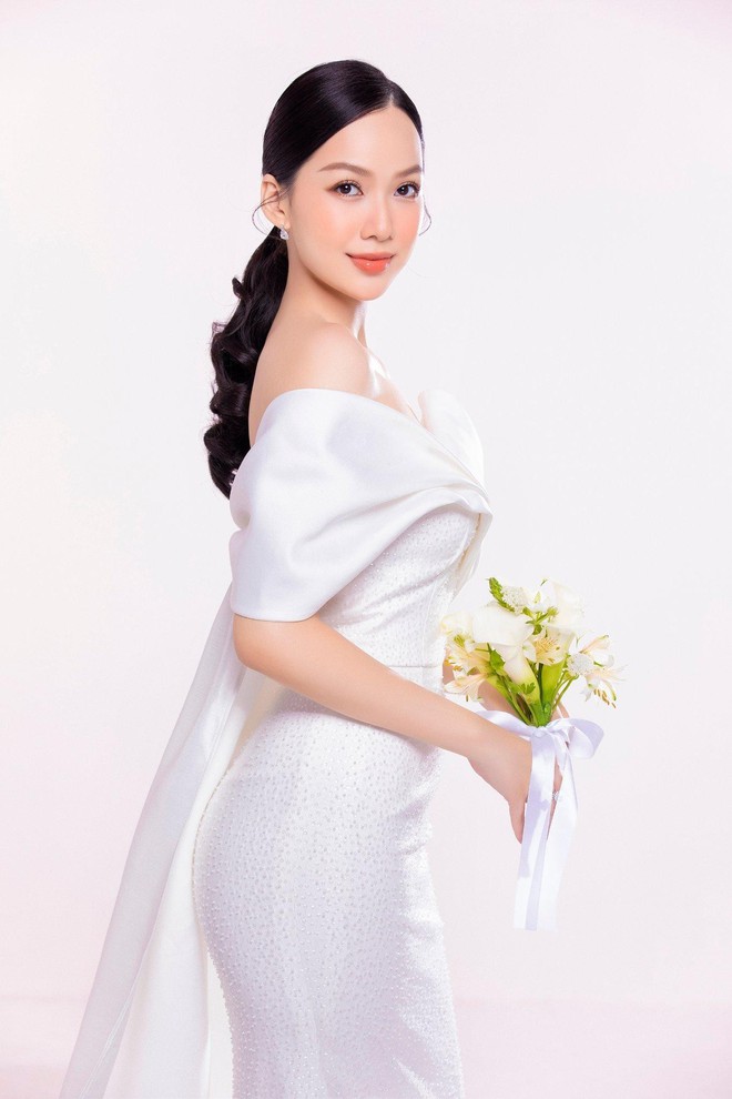 Cô gái có làn da đẹp nhất HHVN 2020 tung ảnh cưới đẹp lung linh, danh tính chú rể vẫn giấu kín - Ảnh 11.