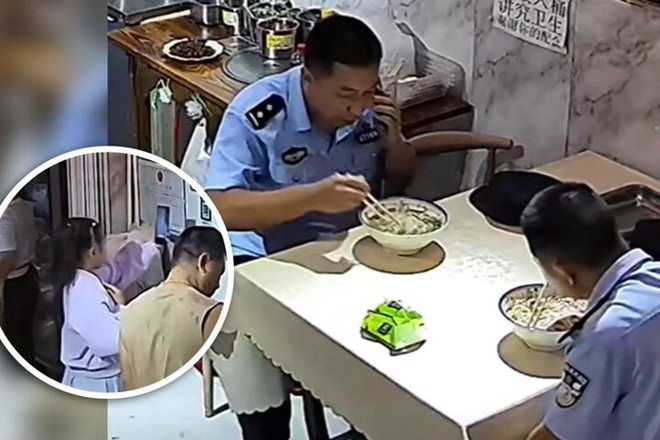 Bé gái 10 tuổi bí mật trả tiền ăn cho hai cảnh sát trong nhà hàng gây sốt mạng - Ảnh 1. Bé gái 10 tuổi bí mật trả tiền ăn cho hai cảnh sát trong nhà hàng gây sốt mạng - Ảnh 1.