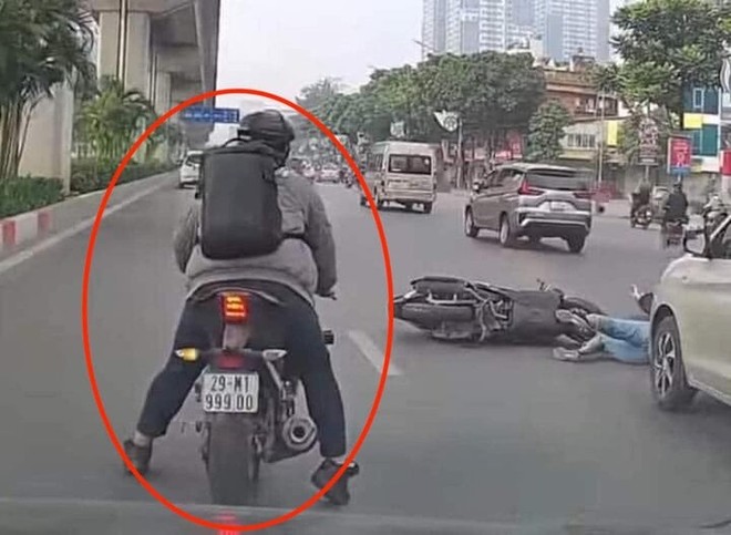 CSGT Hà Nội truy tìm nam thanh niên đi xe máy gây tai nạn với phụ nữ rồi bỏ chạy - Ảnh 2.