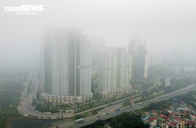 Hà Nội ô nhiễm không khí thứ 3 thế giới, bầu trời mịt mù từ sáng tới trưa - Ảnh 4.