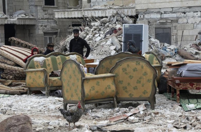 Những hình ảnh nhói lòng về hậu quả động đất ở Thổ Nhĩ Kỳ và Syria - Ảnh 14.