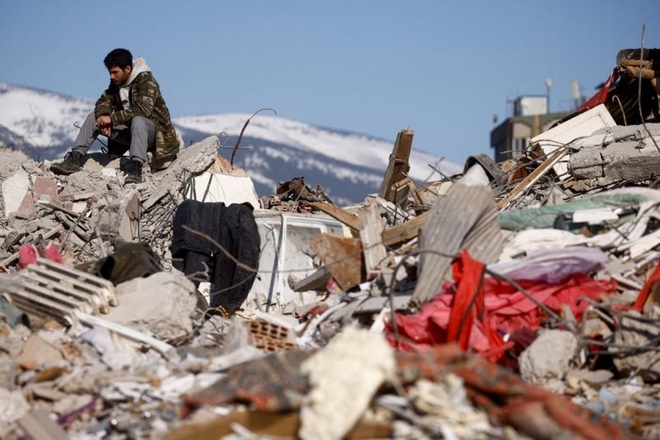 Những hình ảnh nhói lòng về hậu quả động đất ở Thổ Nhĩ Kỳ và Syria - Ảnh 9.