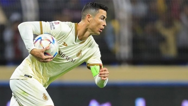 Ronaldo hạnh phúc khi ghi bàn thắng đầu tiên cho Al Nassr - Ảnh 1.