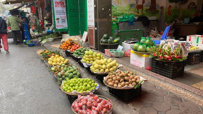 Nhộn nhịp thị trường thực phẩm ngày Rằm tháng Giêng: Nhu cầu mua sắm tăng cao, giá vẫn bình ổn - Ảnh 7.