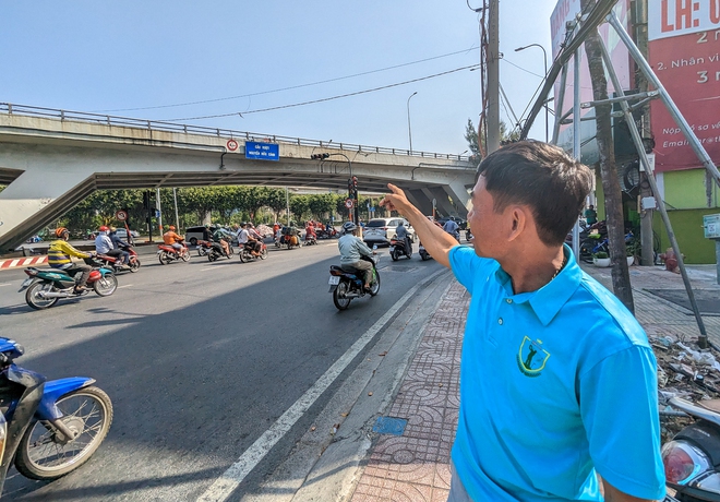 Cầu vượt Nguyễn Hữu Cảnh thông xe trở lại sau 5 tháng, người dân phấn khởi vì thoát ùn tắc - Ảnh 4.