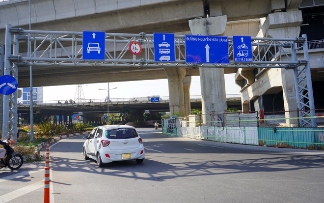 Cầu vượt Nguyễn Hữu Cảnh thông xe trở lại sau 5 tháng, người dân phấn khởi vì thoát ùn tắc - Ảnh 3.