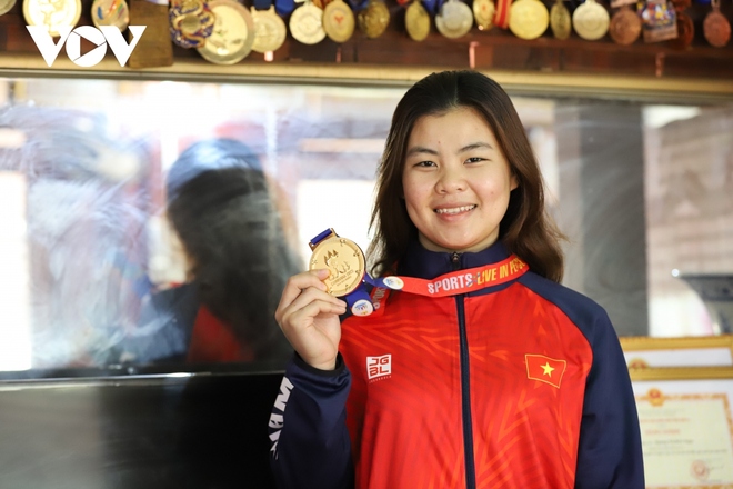 Cô gái dân tộc Thái đoạt huy chương vàng liên tiếp ở 2 kỳ SEA Games - Ảnh 4.