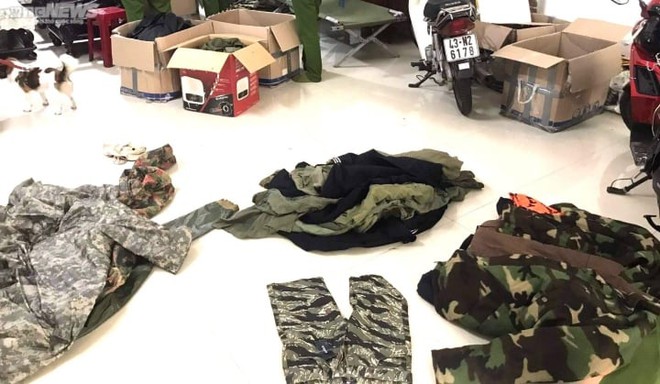 Đà Nẵng: Tiêu hủy gần 500 sản phẩm quần áo, mũ nhãn hiệu quân phục nước ngoài - Ảnh 2.