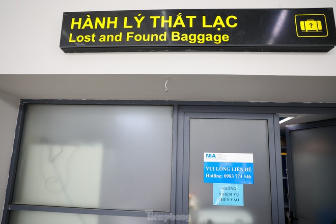 Kho hành lý thất lạc đầy ắp ở sân bay Nội Bài, cách nào để hành khách tìm lại nhanh nhất? - Ảnh 2.