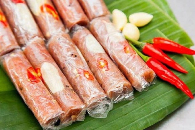 Những m&oacute;n ăn c&oacute; thể truyền nhiễm k&yacute; sinh tr&ugrave;ng cho người - Ảnh 2.