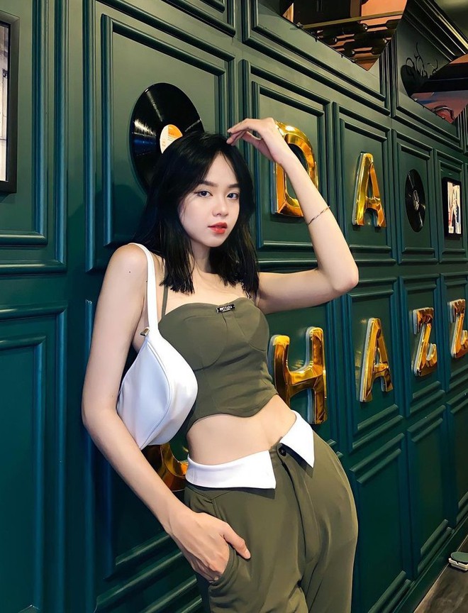 Hoa hậu Thanh Thủy chuộng mặc crop top khoe eo thon - Ảnh 10.