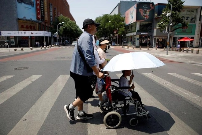 Thời trang chống nắng thịnh hành ở Trung Quốc khi nhiệt độ tăng cao kỷ lục - Ảnh 5.