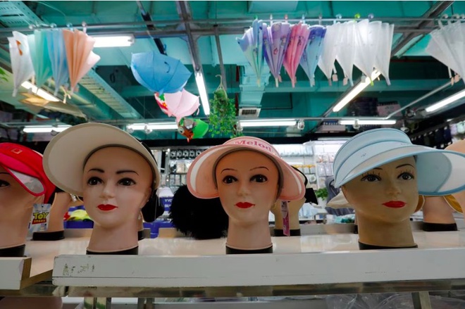 Thời trang chống nắng thịnh hành ở Trung Quốc khi nhiệt độ tăng cao kỷ lục - Ảnh 3.
