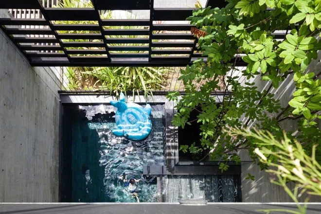 Ngôi nhà 3 thế hệ chung sống có thiết kế đặc biệt: Không cần điều hòa vẫn mát quanh năm, bể bơi lơ lửng giữa phòng khách - Ảnh 6.