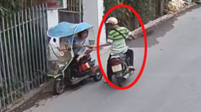 Truy t&igrave;m kẻ giật hơn 210 tờ v&eacute; số của người khuyết tật ở B&igrave;nh Dương - Ảnh 2.